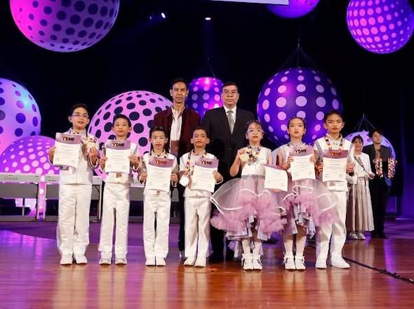 Congratulations to Mr.Theetat Na Chiangmai (Aroot) G.3 Inter Red for receiving the Outstanding Award at the Yamaha Thailand Music Festival 2026 – National Final Round in the Electone Team Talent Category (Under 10 years old) held at Mahidol Sitthakarn Hall, College of Music, Mahidol University.